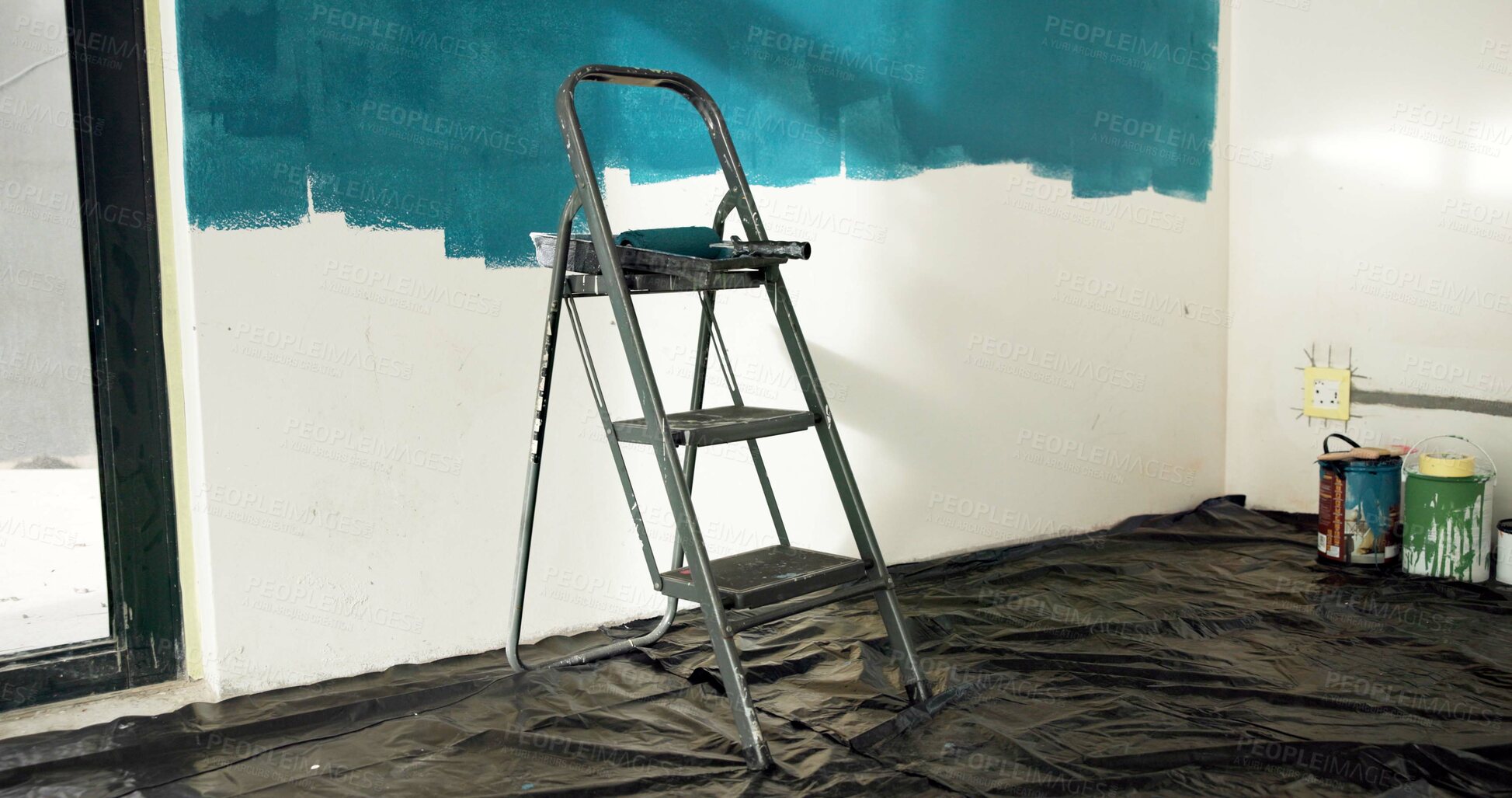 Buy stock photo Ladder, wall and painting for home improvement with empty room for property development with color. Interior design, tools and equipment with tarp cover for splatter, renovation or remodeling project