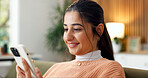 Woman, phone and relax with connection in home, internet scroll or chat online with mobile app. Person, tech or cellphone for communication, social media or text message with happiness on couch