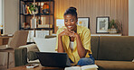 Smile, woman and student in home with laptop, good news and email for university acceptance. Happy, African person or reading at house with pc, exam results and notification for elearning scholarship