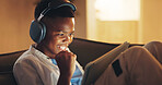 Headphones, fist pump and black child with tablet in home at night with elearning, gaming or online growth. Celebration, happy and boy with technology for game on app for development or education.