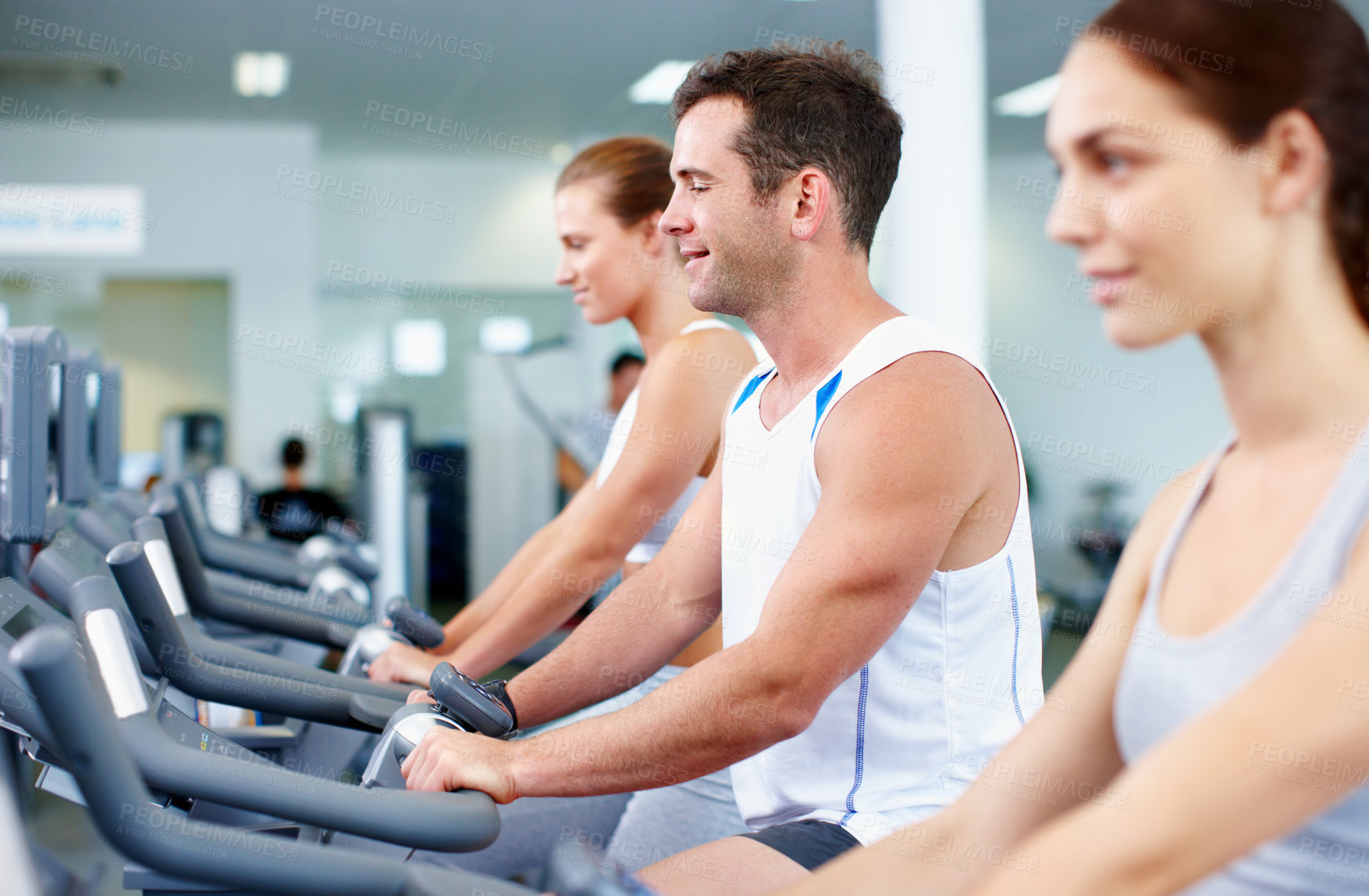 Buy stock photo Gym, fitness and happy people on exercise bike, self care and training for muscle strength or health. Cycling, wellness and group on cardio machine, endurance and lose weight with workout routine
