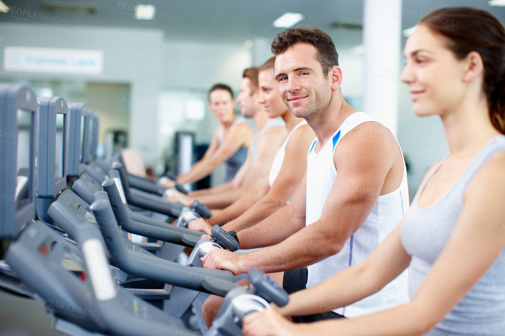Buy stock photo Gym, cycling and happy man on exercise bike, self care and training for muscle strength or wellness. Fitness club, portrait and people on cardio machine, endurance or lose weight with workout routine