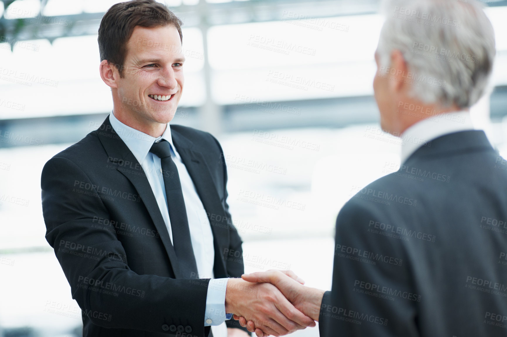 Buy stock photo Shaking hands, smile and business men with greeting, welcome or partnership for real estate agreement. Handshake, introduction and happy people in office with property investment, deal or meeting
