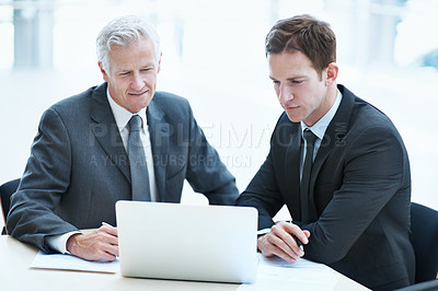 Buy stock photo People, research and planning at law firm with laptop, manager review and legal aid for court case. Attorney, men and reading lawsuit terms in office with computer, strategy and team collaboration.