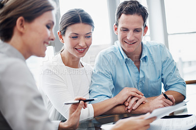 Buy stock photo Finance, happy couple and paperwork in office for consultation, contract update and holding hands. Document, married people and broker in meeting for investment guide to qualify for premium cover