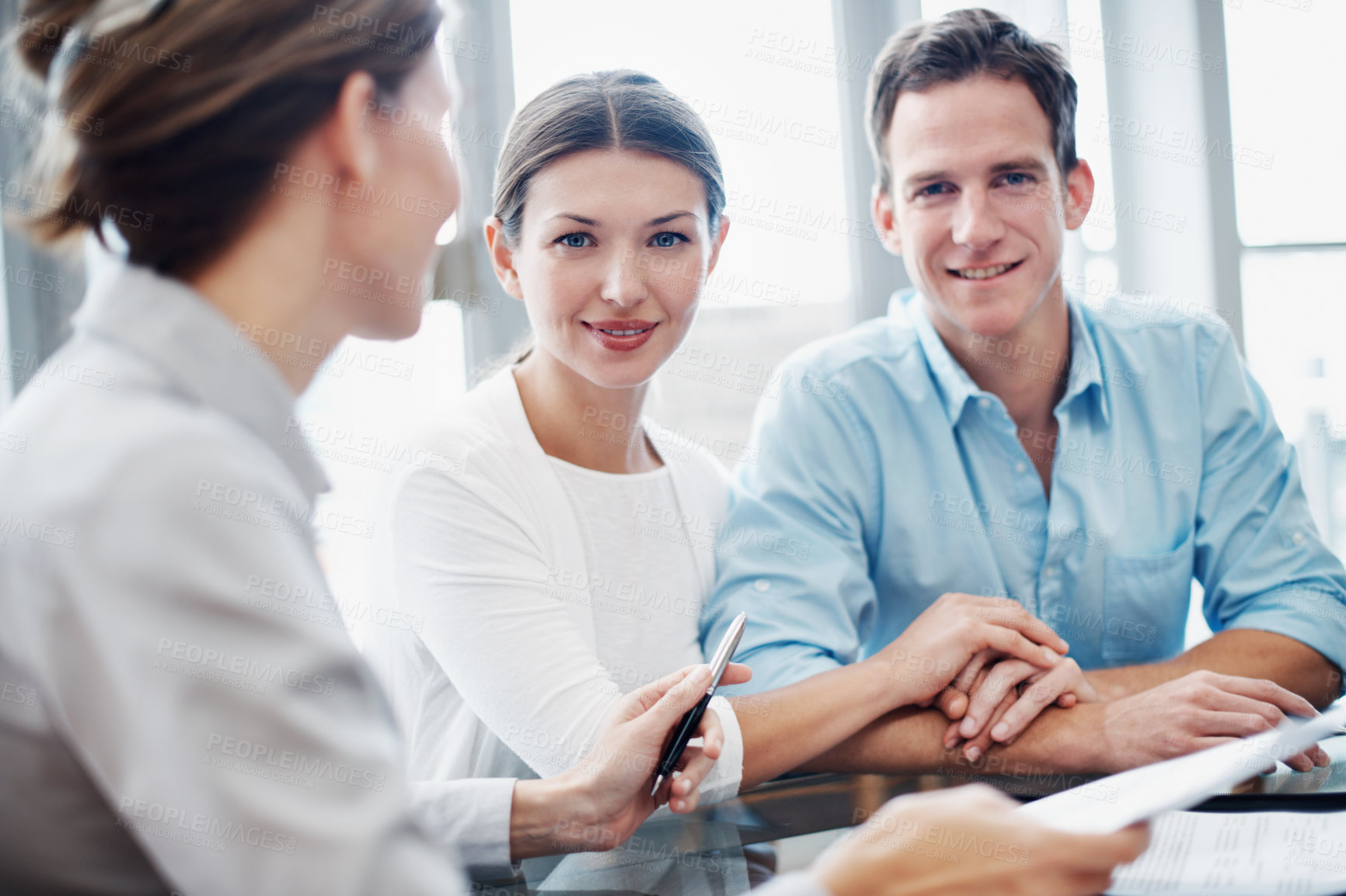 Buy stock photo Finance, couple and portrait in office with consultant, insurance policy update and holding hands. Support, happy people and broker agent in meeting for investment guide, asset management or planning