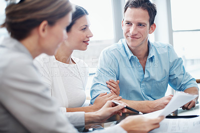 Buy stock photo Contract, couple and meeting with financial advisor for agreement, consulting or investment. Documents, finance and report with broker speaking to people in office for portfolio development or growth