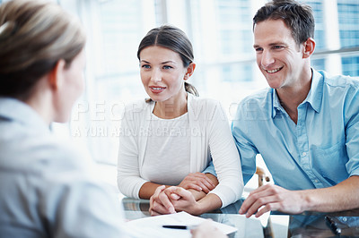 Buy stock photo Couple, discussion and meeting with financial advisor for consulting, conversation or investment. Accounting, finance or management with broker speaking to people in office for portfolio growth