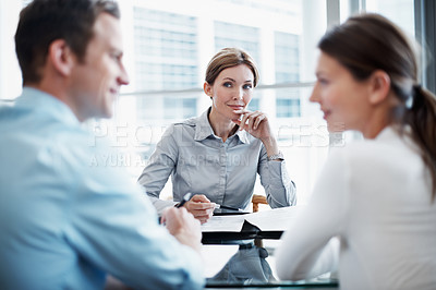 Buy stock photo Thinking, woman and financial advisor with couple in consultation, discussion and asset management. Happy people, consultant or clients with insurance document, investment contract or wealth planning