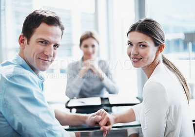 Buy stock photo Portrait, couple and financial advisor in office, holding hands and smile for asset management. Happy man, woman and investment consultant with clients for support, insurance and budget review