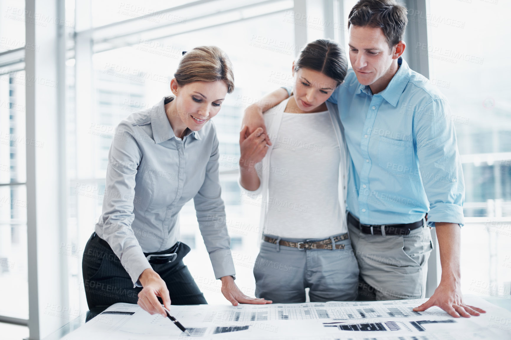 Buy stock photo Architect, couple and review documents, floor plan or budget planning for renovation in office. Happy people, paperwork and clients with blueprint in consultation, building design or development cost