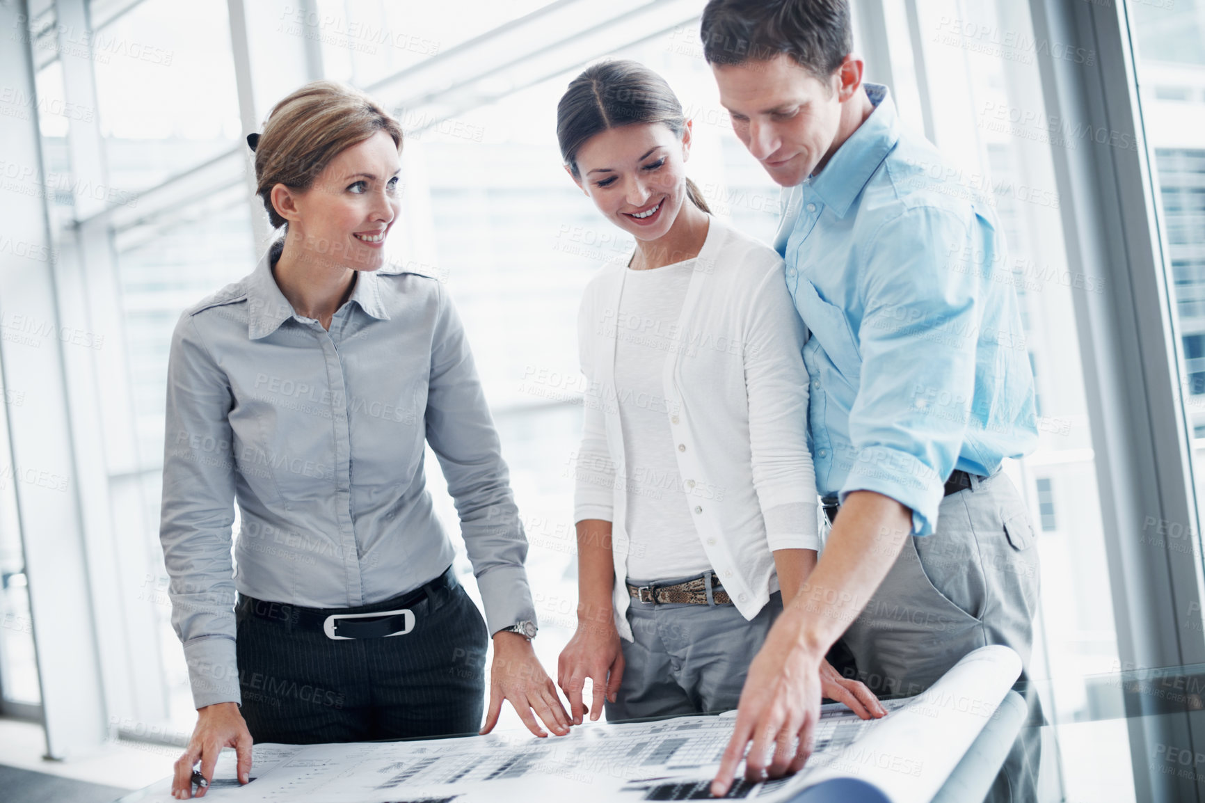 Buy stock photo Architect, couple and documents review with blueprint or budget planning for renovation in office. Happy clients, paper and people with floor plan in consultation, building design or development cost