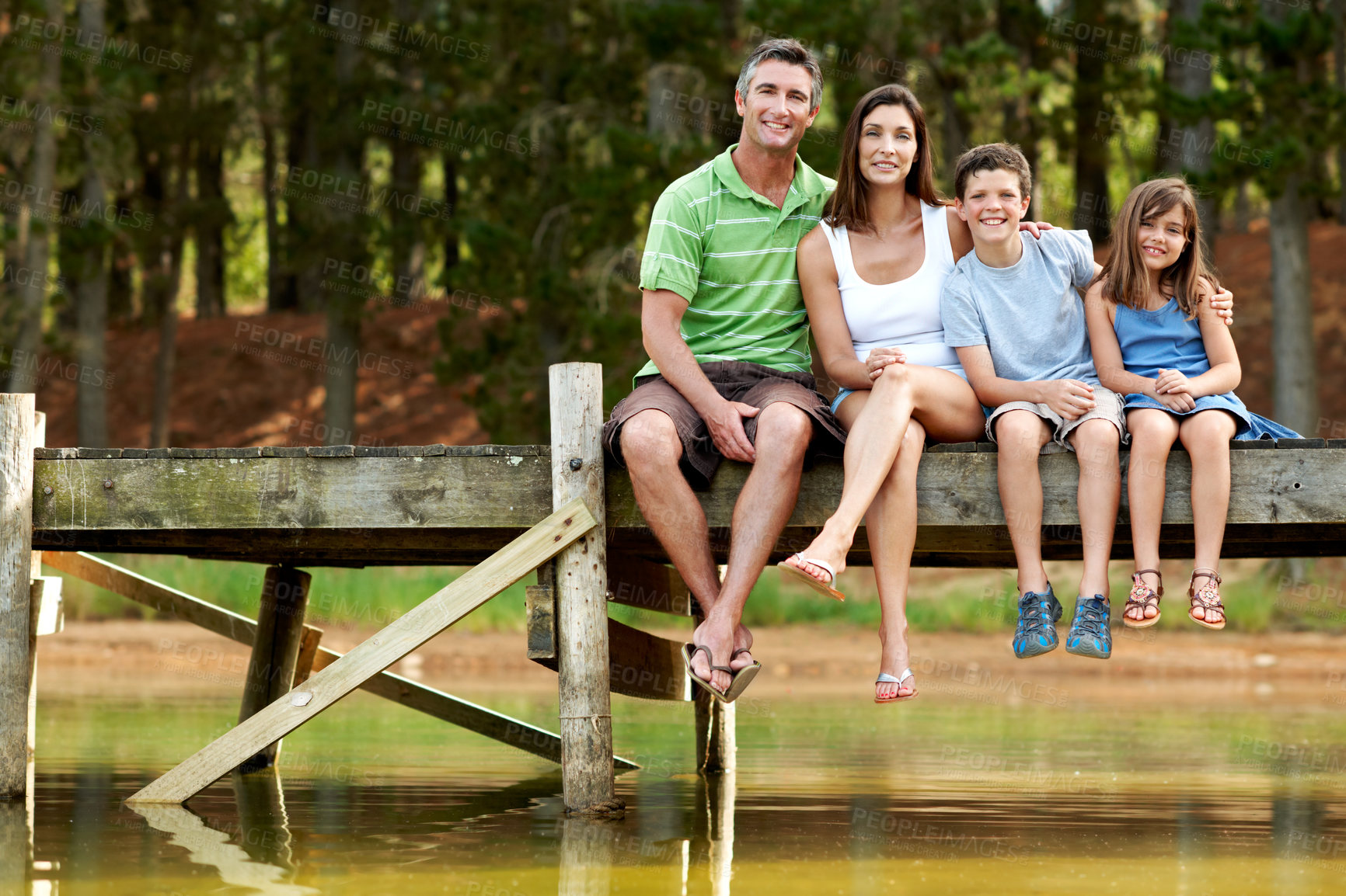 Buy stock photo Holiday, parents or children on deck with portrait, bonding together or connection on summer vacation. Smile, hug or family at lake with love, happy moment or healthy relationship on outdoor trip.