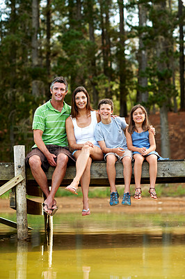 Buy stock photo Holiday, hug or family on deck with portrait, bonding together or connection on summer vacation. Love, parents or children at lake with embrace, happy moment or healthy relationship on outdoor trip.