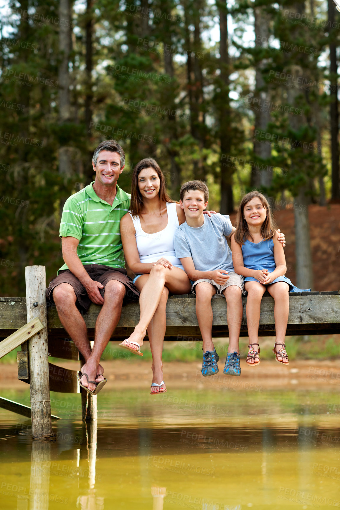 Buy stock photo Holiday, hug or family on deck with portrait, bonding together or connection on summer vacation. Love, parents or children at lake with embrace, happy moment or healthy relationship on outdoor trip.