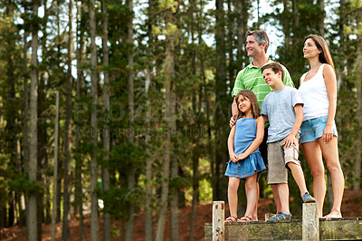 Buy stock photo Sightseeing, family and travel with children in nature, mom and dad with smile on holiday or bonding. Space, happy people and parents with kids outdoor, connection or adventure in forest and vacation