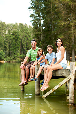 Buy stock photo Holiday, smile or family on deck with portrait, bonding together or connection on summer vacation. Trip, parents or children with love, happy moment or healthy relationship on lake getaway.