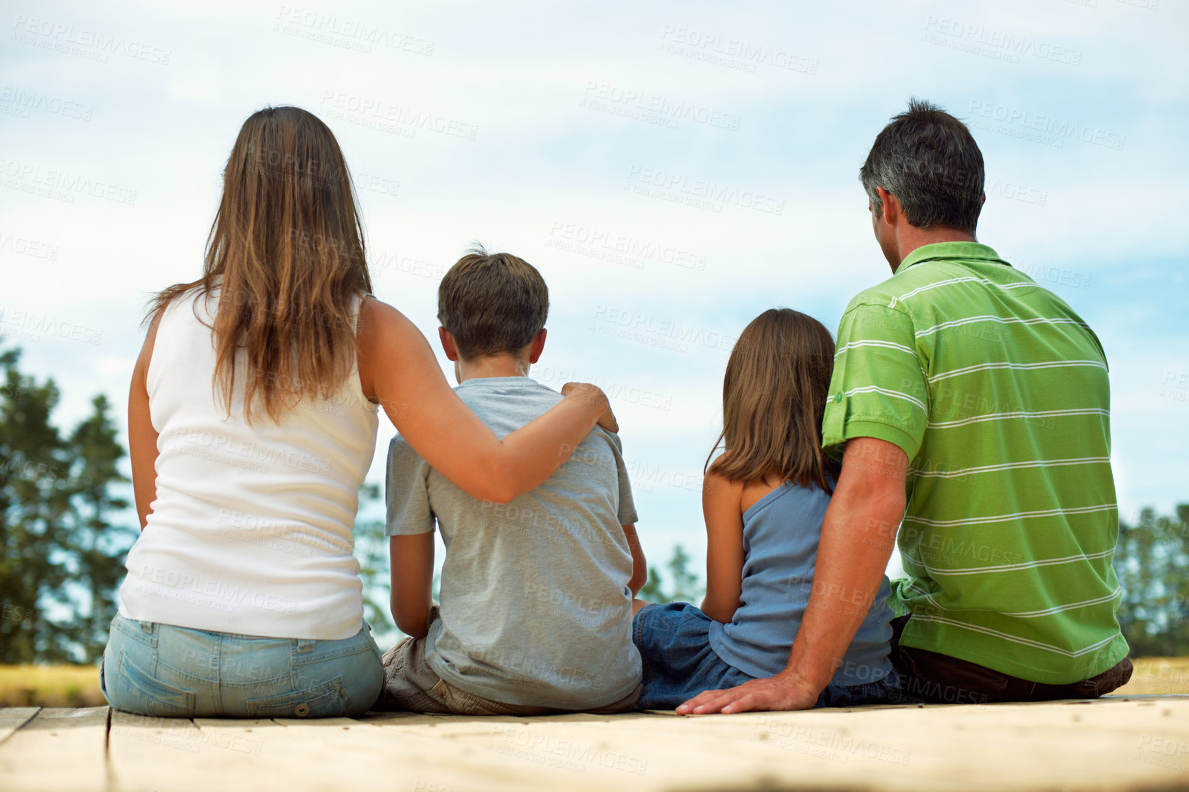 Buy stock photo Family, back and dock by lake for vacation with countryside, bonding and relax in nature together. Parents, children and break with jetty outdoor for holiday, summer trip and travel in forest