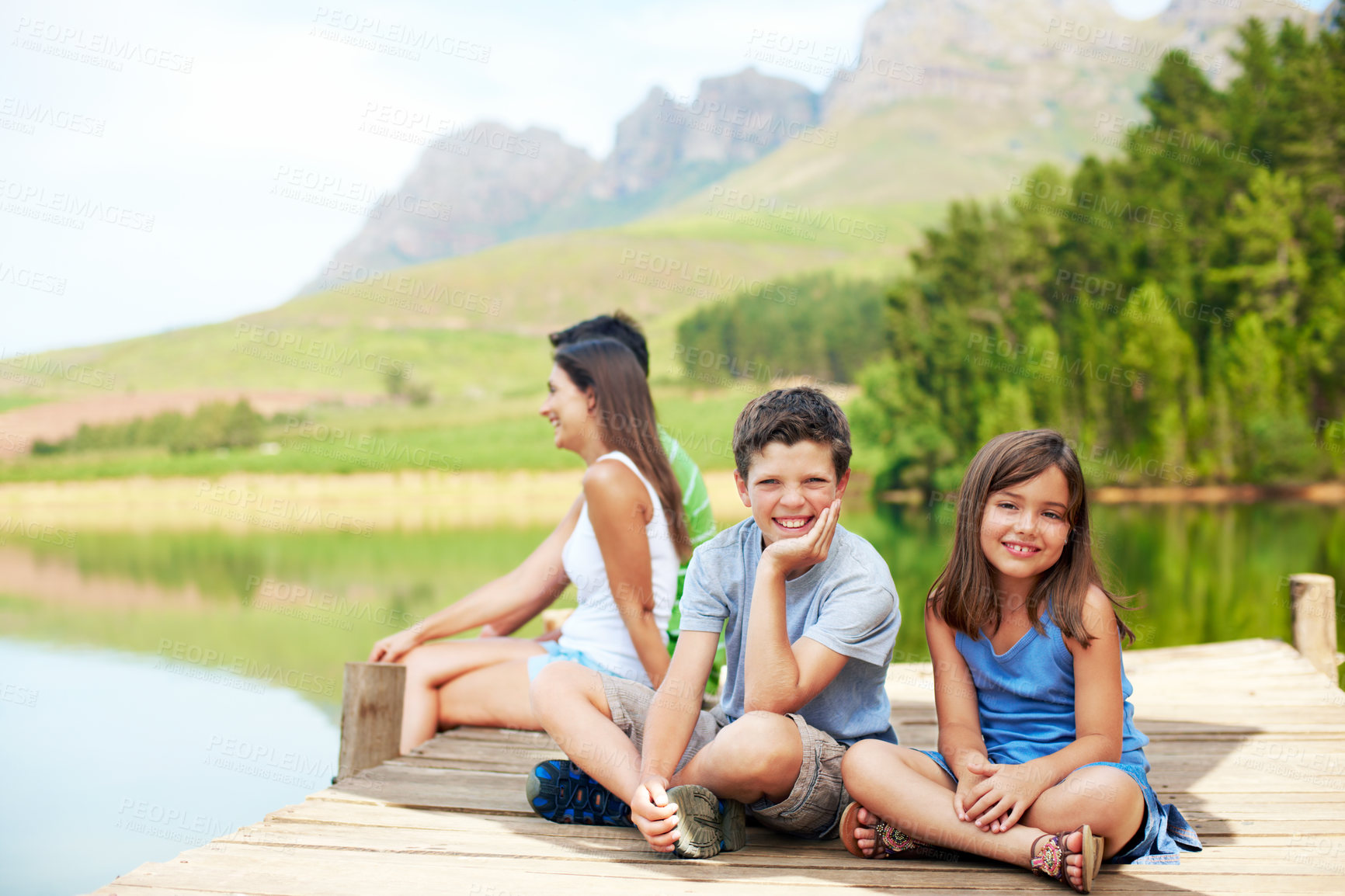 Buy stock photo Children, portrait and smile on dock for vacation with countryside, bonding and relax in nature together. Family, brother and sister with jetty outdoor for holiday, summer trip and travel by lake