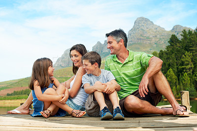 Buy stock photo Family, children and smile on dock for holiday with camping, bonding and relax in nature together. Mother, father and kids with pier outdoor for vacation, summer trip and travel in countryside