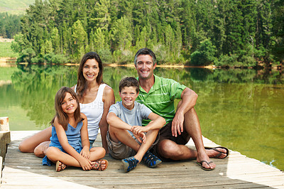 Buy stock photo Travel, smile or family on deck with portrait, bonding together or connection on summer vacation. Trip, parents or children at lake with love, happy moment or healthy relationship on nature getaway.