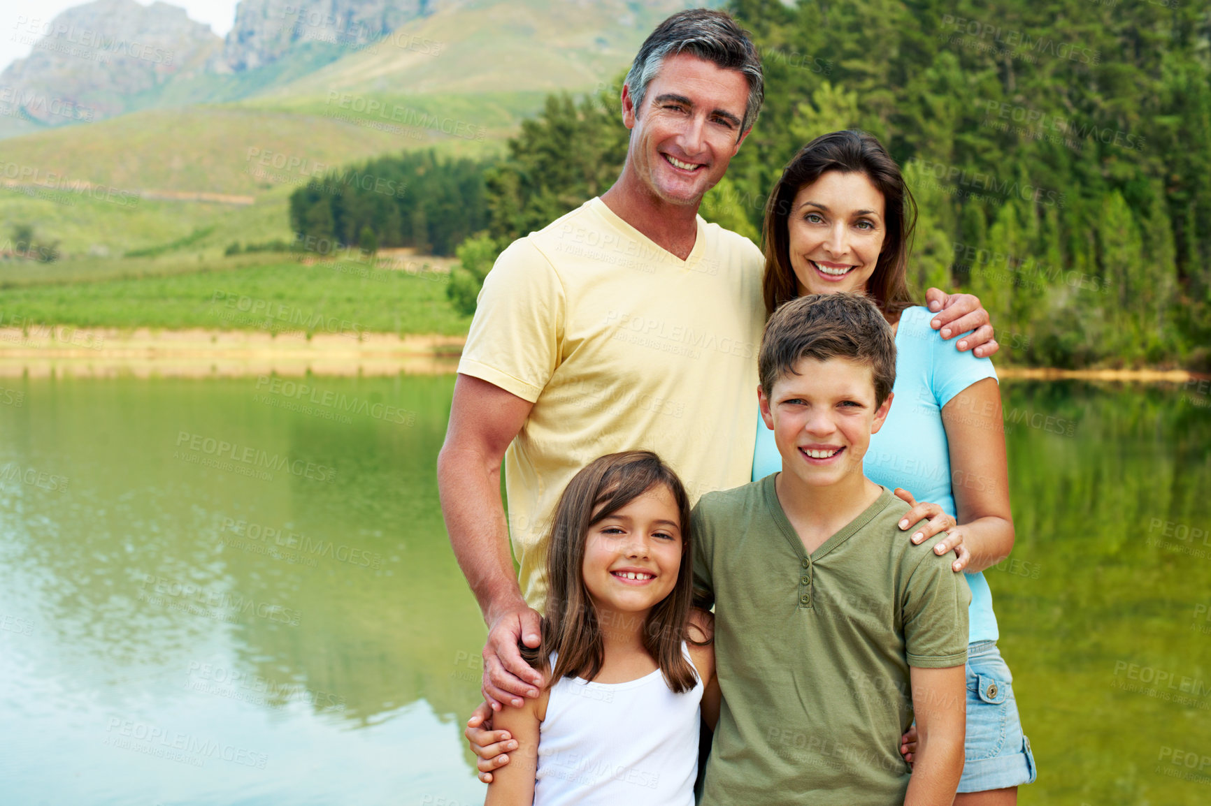 Buy stock photo Holiday, parents or kids at river with portrait, bonding together or connection on summer vacation. Smile, children or family with embrace, happy moment or healthy relationship on lake getaway.