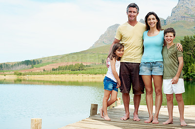 Buy stock photo Holiday, portrait or family at river with hug, bonding together or connection on summer vacation. Space, parents or children on deck with embrace, happy moment or healthy relationship on lake getaway