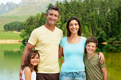 Buy stock photo Holiday, portrait or family at lake with hug, bonding together or connection on summer vacation. Smile, parents or children at river with embrace, happy moment or healthy relationship on getaway.