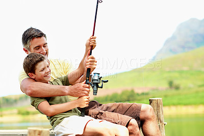 Buy stock photo Family, dad and fishing with teenager in nature, hobby and bonding with son on holiday or connection. Teaching, boy and man with rod to catch fish, learn and laughing with father on vacation and fun