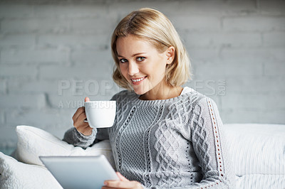 Buy stock photo Portrait of a smiling young woman holding a digital tablet and a cup of coffee