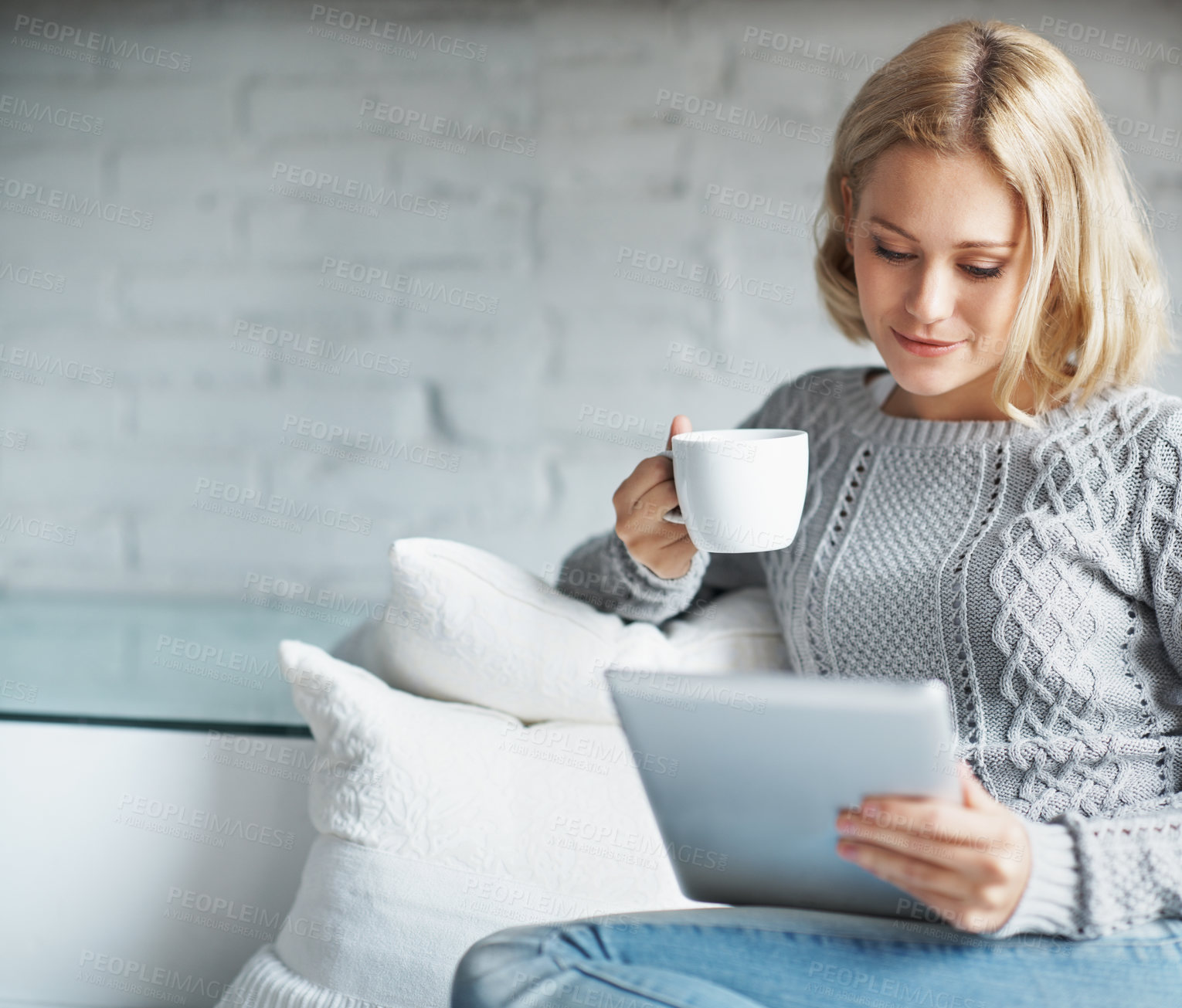 Buy stock photo Space, tablet and woman on sofa with coffee for internet, online subscription and relax with ebook. Home, smile and person on tech for connection, streaming and reading website with drink on weekend