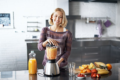 Buy stock photo A young woman with a homemade smoothie