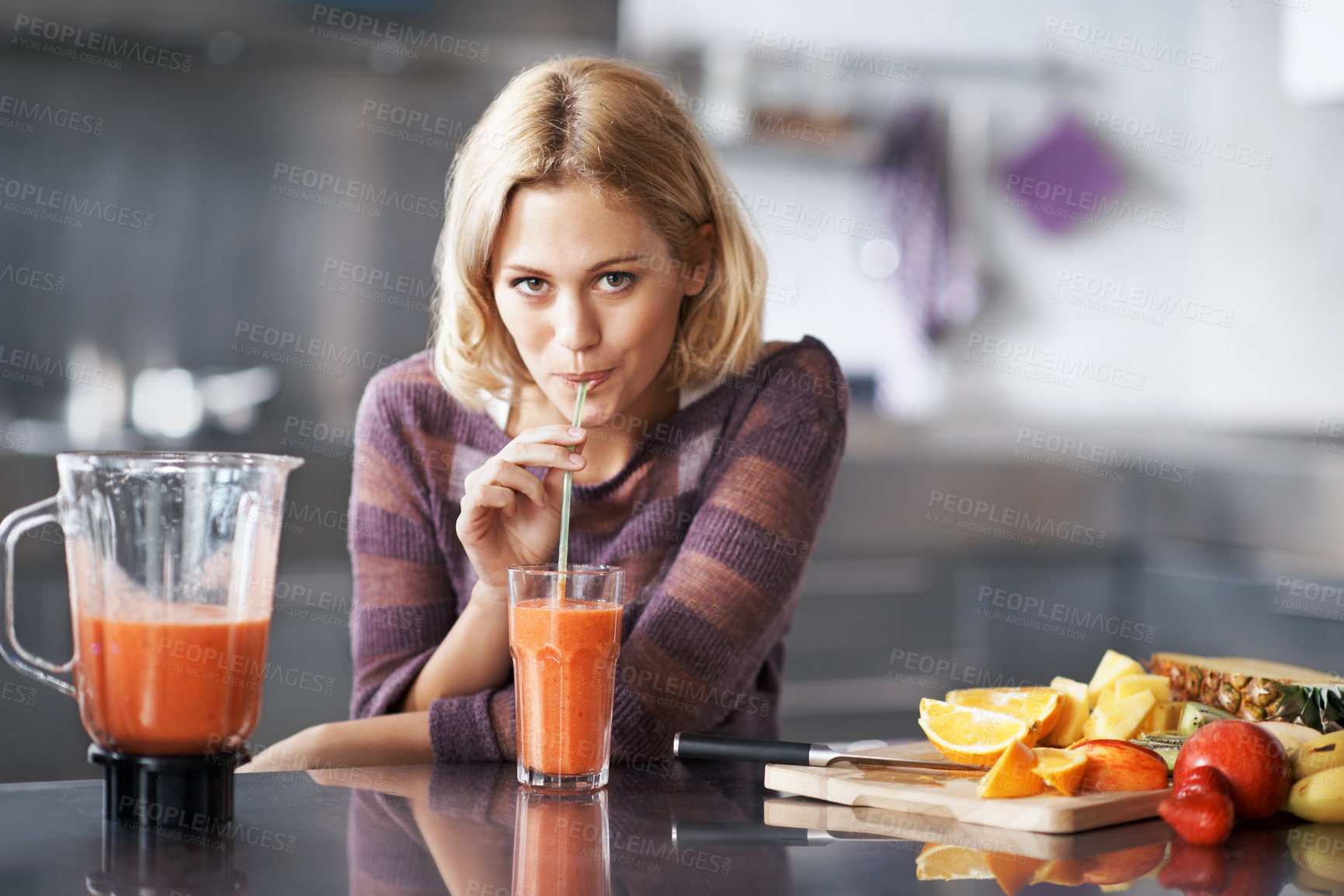 Buy stock photo Smoothie, portrait and woman with blender, straw and benefits for morning in kitchen. Home, happy person and fruit shake for weight loss diet, organic beverage and gut health or digestion detox