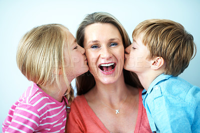 Buy stock photo Family, kiss and mom with children in house, portrait and bonding with smile on break and connection. Happy woman, home and affection for kids, childcare and single parent with pride in Australia