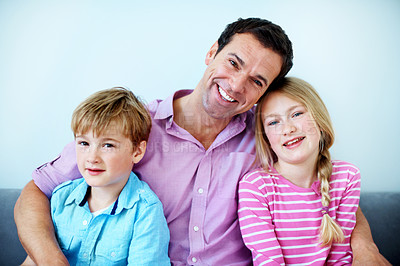Buy stock photo Childcare, dad and children in house with portrait, child growth or bonding together on weekend break. Space, smile or people with hug, happy moment or family connection in childhood development.