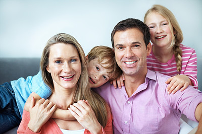 Buy stock photo Childcare, portrait and family in house with hug, child growth or bonding together on weekend break. Relax, parents or kids with embrace, happy moment or sibling connection in childhood development.