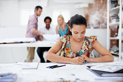 Buy stock photo Architect, woman or writing with documents in office for building design or construction planning. Female person, property designer or civil engineer with paperwork for architecture project or layout