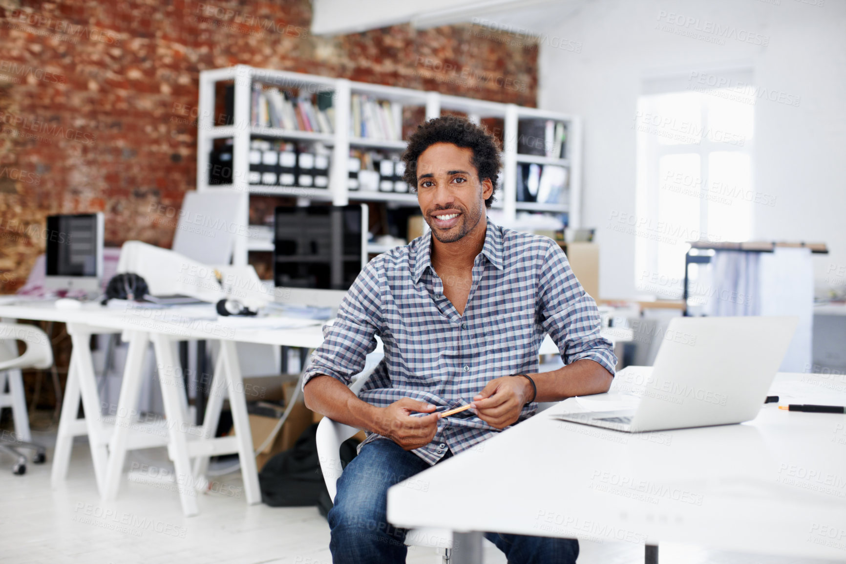 Buy stock photo Business, man and happy with laptop in office for app development, site testing and about us. Web designer, black person and portrait at design agency for debugging, programming and software update