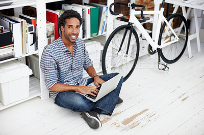 Buy stock photo Laptop, portrait and businessman with bicycle in office for copywriting, online article and story draft. Creative, startup and African person on computer for research, website and report with bike