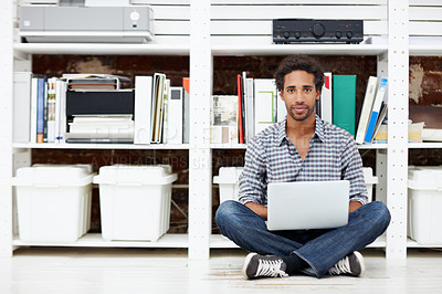 Buy stock photo Laptop, portrait and black man on floor for copywriting, online article and story draft in office. Creative, startup and person on computer for research, website blog and digital report in workplace