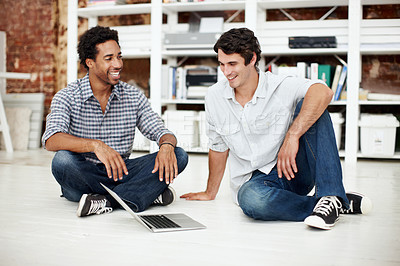 Buy stock photo Creative, meeting and men on floor with laptop, research and online video for digital marketing. Happy, team and people on computer laugh for website, internet and relax on break at design agency