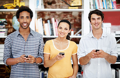 Buy stock photo Portrait, people and phone in office with tech, pride and creative collaboration for digital marketing. Smile, employee group and copywriter in workplace with teamwork, online advertising or about us