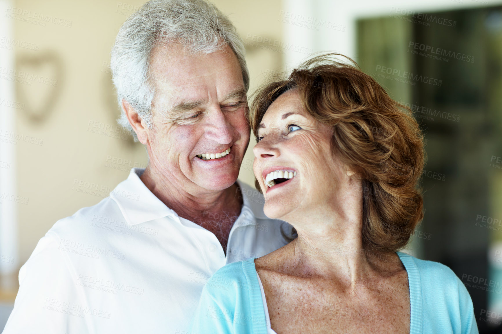 Buy stock photo Love, laughing and senior couple in home with support, happiness and care in retirement. Elderly man, woman and marriage for trust, funny together and bonding with spouse or partner in old age