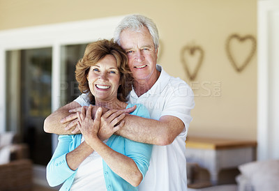 Buy stock photo Senior, portrait and happy couple hug in home for bonding, commitment and loyalty for marriage. Retirement, weekend and man with woman embrace for affection, love and connection for relationship
