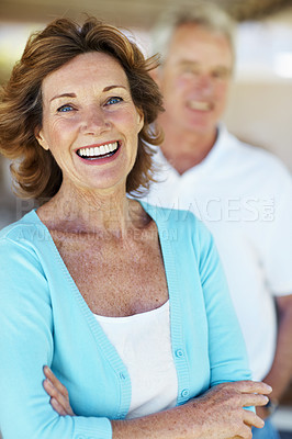 Buy stock photo Couple, laugh and portrait of senior woman in home for marriage, relationship and partnership. Happy, retirement and people with smile for connection, support and love for bonding, trust and loyalty