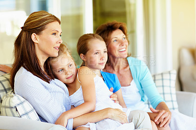 Buy stock photo Family, children and relax in home on patio, generations bonding together and connection on weekend. Happy, grandma and mother chill on sofa with girl kids, remember memories and care for wellness.