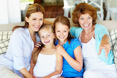 Buy stock photo Family, children and watching tv in home with smile, generations bonding together and point to show. Happy, grandma and mother on sofa with girl kids, streaming movie and entertainment on weekend.