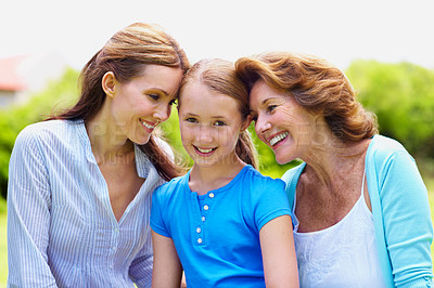 Buy stock photo Grandmother, mama and child with care at backyard, laugh and bonding together for connection. Generations, daughter and mom with grandparent, girl and love with portrait of happy family at garden