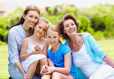 Buy stock photo Grandmother, mother and portrait of children with love at backyard, relax and smile for support. Generations, sisters and happy mom with grandparent, kids and care with family on garden grass