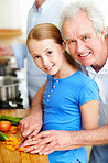 Grandpa teaching me how to chop vegetables
